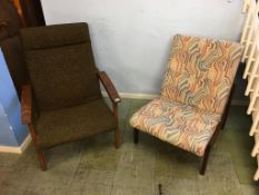 Two teak armchairs