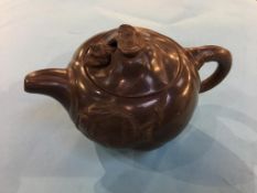 A terracotta Chinese teapot