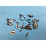 Collection of Native American style sterling brooches and pendants