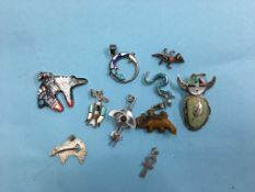 Collection of Native American style sterling brooches and pendants