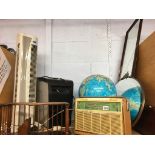 Radio, bookshelf, a globe etc.