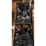 Two boxes of cameras