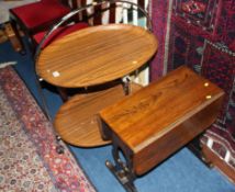 An oval folding tea trolley and drop flap table