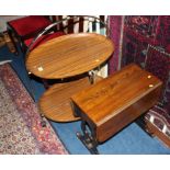 An oval folding tea trolley and drop flap table