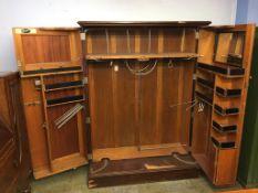 A mahogany double door 'Compactum Limited' wardrobe, with fully fitted interior