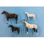 Four Beswick horses