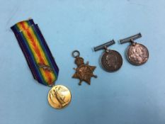 World War I trio to 13327 CPL G.E Fitzjohn Yorks and a single medal to 108705 GNR W.J. Gibson R.A.