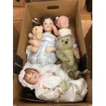 Three dolls and a teddy bear. Contactless collection is strictly by appointment on Thursday,