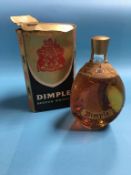 A bottle of Dimple whiskey and box. Contactless collection is strictly by appointment on Thursday,