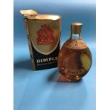 A bottle of Dimple whiskey and box. Contactless collection is strictly by appointment on Thursday,