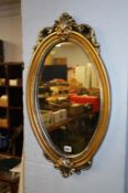 Gilt oval mirror. Contactless collection is strictly by appointment on Thursday, Friday and Saturday