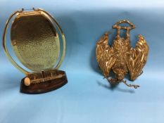 A hanging brass coat rack, in the form of a bat and a brass dinner gong. Contactless collection is