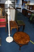 Cream standard lamp and a walnut claw and ball table. Contactless collection is strictly by