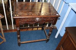 A carved oak single drawer side table, 66cm wide. Contactless collection is strictly by