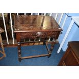 A carved oak single drawer side table, 66cm wide. Contactless collection is strictly by