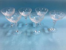 A set of six etched champagne / cocktail glasses. Contactless collection is strictly by