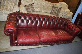 Oxblood Chesterfield three seater settee. Contactless collection is strictly by appointment on