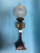 A silver plated oil lamp with etched glass shade. Contactless collection is strictly by