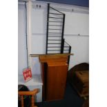 A teak Ladderax wall cabinet and three shelves and a further four narrow shelves. Contactless