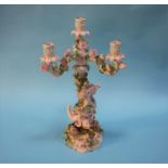 A continental porcelain three branch candelabra. Contactless collection is strictly by appointment