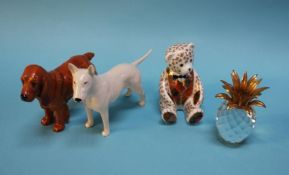 A Swarovski pineapple, a Royal Crown Derby paperweight bear, a Beswick CH Romany rhinestone and a