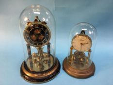 Two Anniversary clocks, under domes. Contactless collection is strictly by appointment on