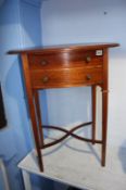 Mahogany oval two drawer side table, 59cm wide. Contactless collection is strictly by appointment on