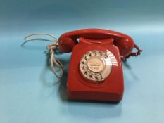 A red dial telephone. Contactless collection is strictly by appointment on Thursday, Friday and