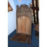 A carved tribal seat. Contactless collection is strictly by appointment on Thursday, Friday and