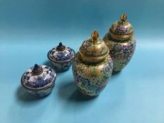 Pair of modern Cloisonne vases and covers and a pair of Chinese blue and white vases and covers,