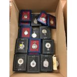 A box of Heritage collection boxed pocket watches