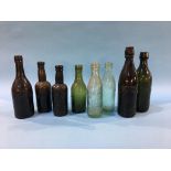 Eight glass advertising bottles to include; M. A. Jones, B. P. Auckland (4), J. W. Cameron and Co.