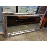 A silver coloured rectangular mirror, 158 x 78cm