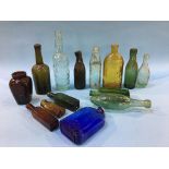 Fourteen glass advertising bottles to include; Ross and Co. Celebrated bottles, Ind Coope and Co.
