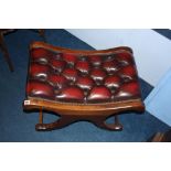 An Oxblood Chesterfield stool