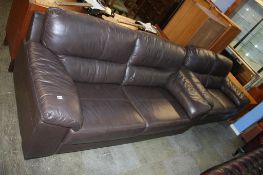 Two brown leather settees