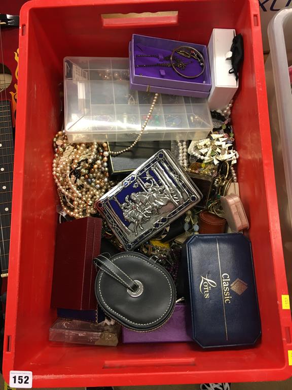 A large box of costume jewellery