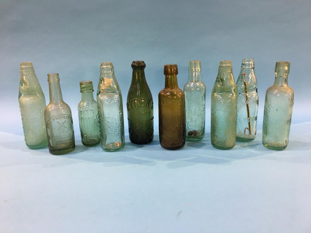 Ten glass advertising bottles to include; W. Conway Ltd, Cleethorpes, Harston and Co., Harrogate,