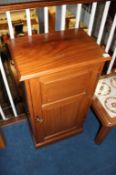 A mahogany single door cabinet, 50cm wide