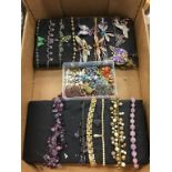 A box of decorative necklaces