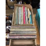 A box of LPs including Bowie, U2, Frank Sinatra, John Denver etc.