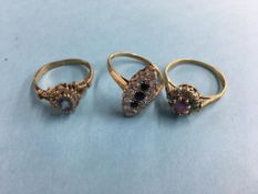 Three 9ct gold dress rings, total weight 7.0 grams