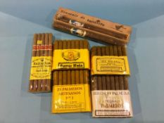 Four packets of Spanish cigars (sealed) etc.