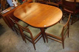 A teak Merridew table and five chairs