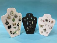 Forty one decorative Silver semi precious stone set pendants