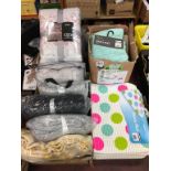 A large quantity of throws and bath mats (as new)