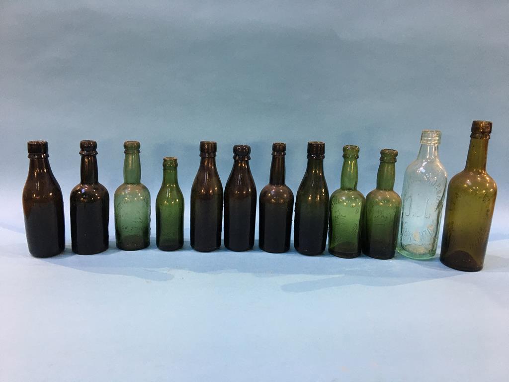 Twelve glass advertising bottles 'South Shields' to include; P. V. Tinwell, R. Henderson, M. Wood - Image 2 of 6