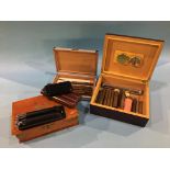 An oak cigar box, two humidors, two cigar cases and a hip flask and cigar case