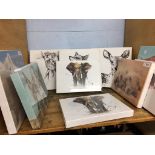 A selection of unframed canvases, animal subjects (as new)