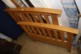 A pale oak single bed, with pop up single bed underneath